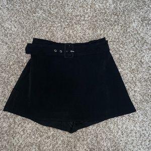 Black DO+BE skort with built in belt. Size large